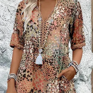 Kvinnors Midi Klänning med V-Hals för Eleganta Tillfällen