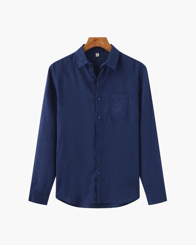Min butik navy blue long sleeve button-up shirt with chest pocket on wooden hanger