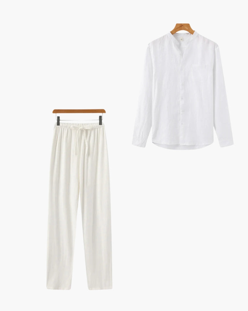 White long sleeve shirt and matching white drawstring pants set on wooden hangers